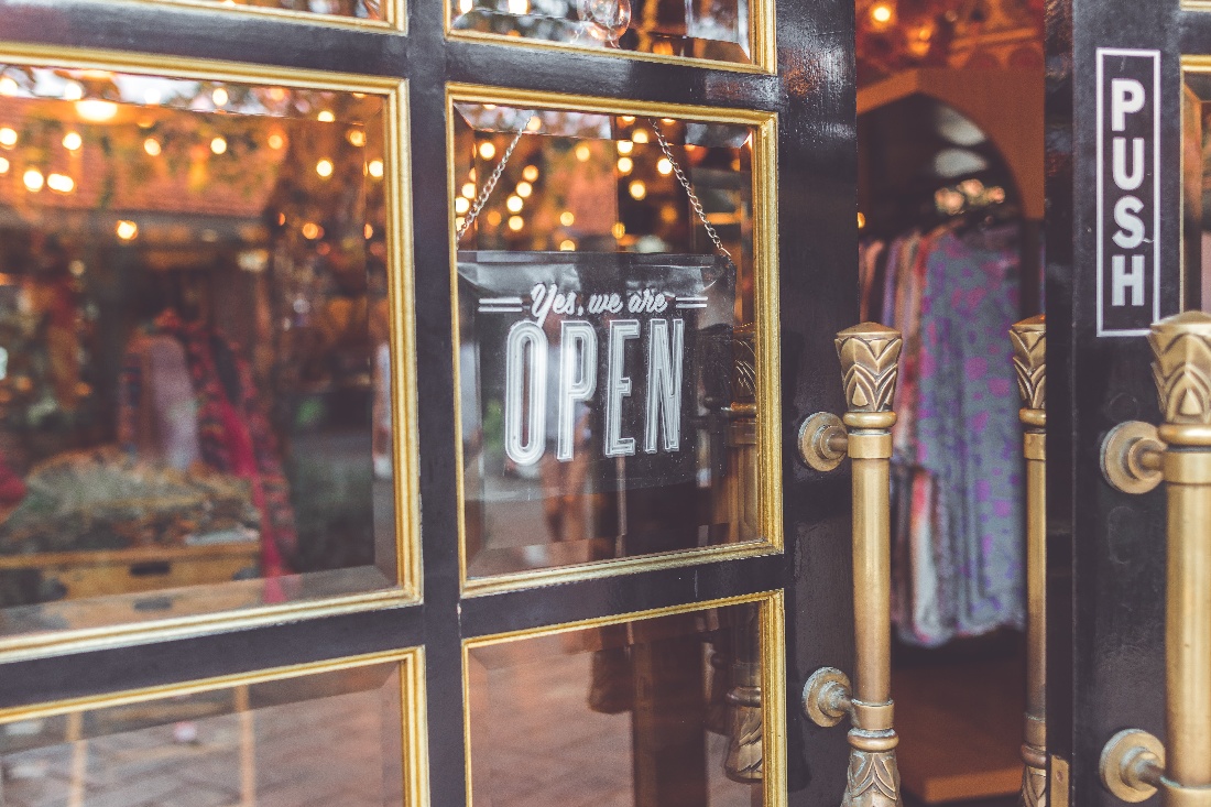 Open retail store with open sign